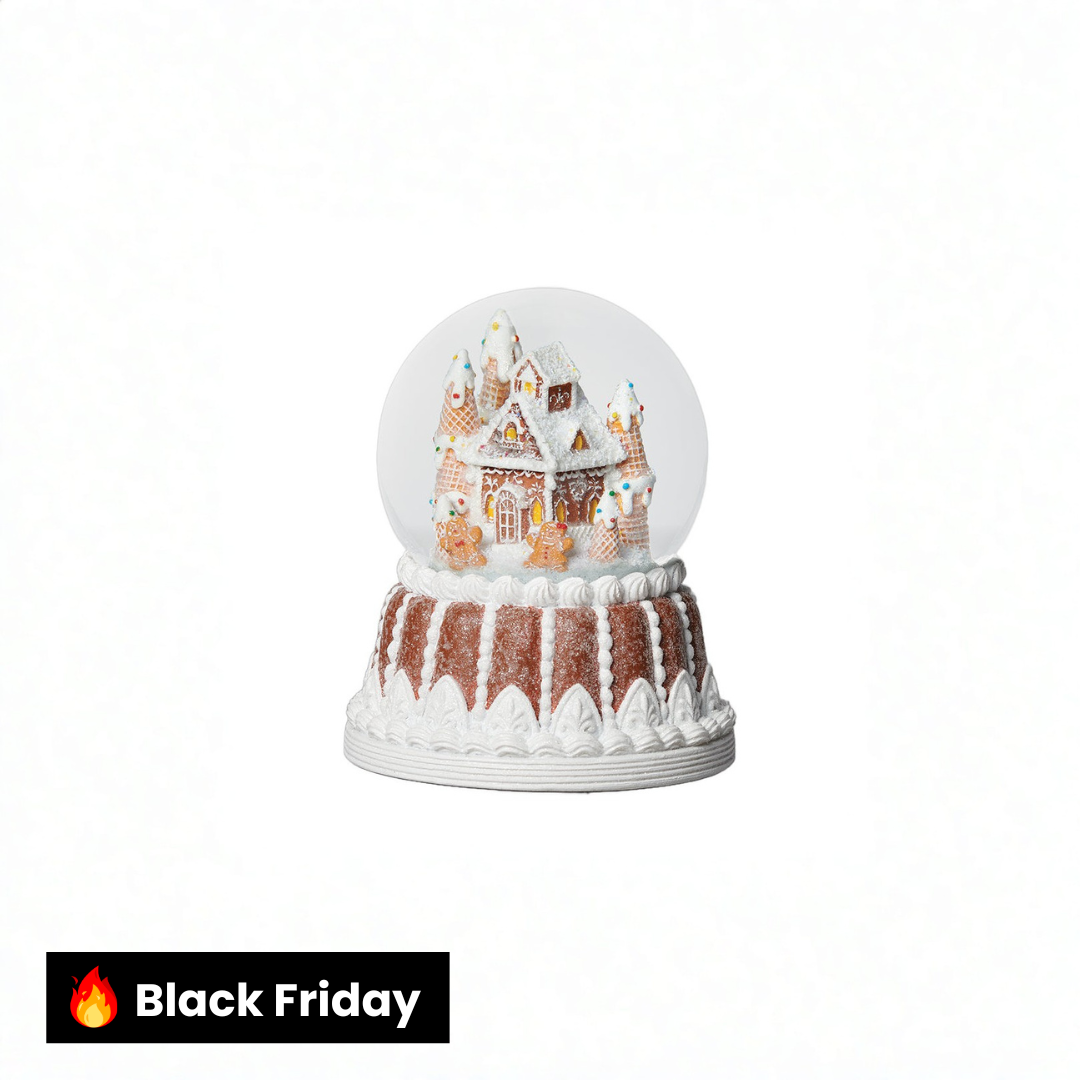 Globo de neve de casa de gengibre em base de gengibre (musical)